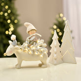 Figurine de Noël Enfant sur renne Pastel LED